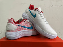 Nike White and Pink Low-Top Sneakers with Blue Swoosh