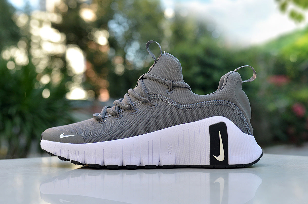 Nike Gray Low-Top Sneakers with White Sole