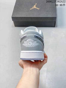 Air Jordan 1 Low White Grey Patterned Swoosh Sneakers