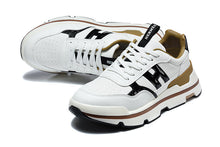 Hermès White and Black Low-Top Sneakers with Brown Trim