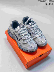 Nike Initiator Low-Top Sneakers in Silver and Black