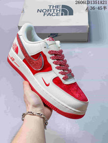 Nike Air Force 1 Low Sneakers with Glitter Swoosh
