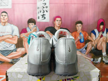 Nike Gray Low-Top Sneakers with Metallic Swoosh
