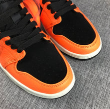 Jordan Air Jordan 1 Mid Orange Black Sneakers