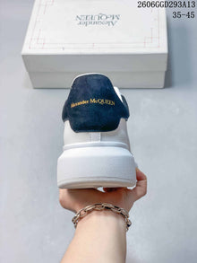 Alexander McQueen White Low-Top Sneakers with Black Heel Tab