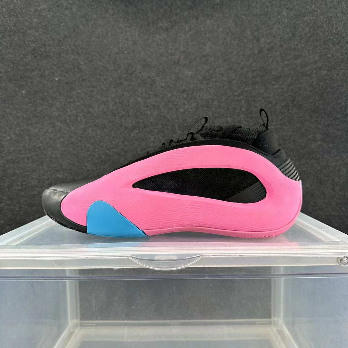 Pink and Black Athletic Sneakers with Blue Accent