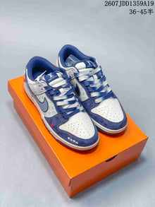 Jordan Air Jordan 1 Low Sneakers White and Navy