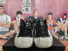 White and Black High-Top Basketball Sneakers