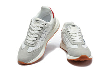 Hermès Grey and White Low-Top Sneakers with Blue Accents
