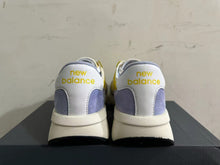 New Balance U370 Sneakers in Yellow and Lavender