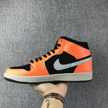 Air Jordan 1 Mid Sneakers in Black, Orange and Grey 554724-062