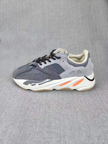 700 Grey Lifestyle Sneakers with Orange Accents
