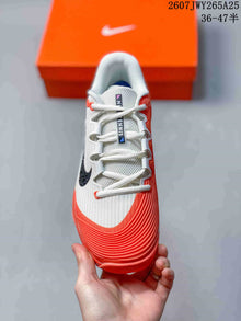 Nike Vapor 12 Low-Top Tennis Shoes White and Coral