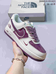 Nike Air Force 1 Low Sneakers with Glitter Swoosh