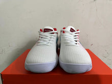 Nike White and Pink Low-Top Sneakers with Blue Swoosh