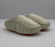 Nike Beige Slip-On Sandals with Orange Sole Details