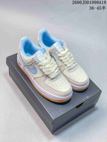 Nike Air Force 1 Low White and Blue Gum Sole Sneakers