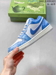Jordan Air Jordan 1 Low Blue and White Sneakers