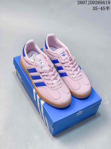 Adidas Originals Gazelle Sneakers in Pink and Blue