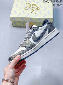 Jordan Air Jordan 1 Low OG SP White and Metallic Gray Sneakers