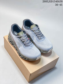 On Cloudmonster Void Low-Top Sneakers in Gray