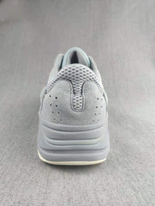 700 Gray and Coral Low-Top Sneakers