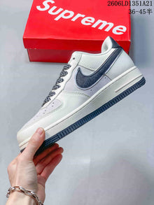 Nike Air Force 1 Low White Sneakers with Dark Swoosh