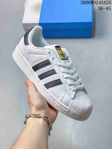 adidas Originals Superstar White and Black Low-Top Sneakers
