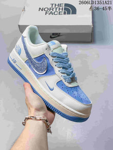 Nike Air Force 1 Low Sneakers with Glitter Swoosh
