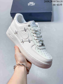 Nike Air Force 1 Low White Sneakers with Metal Swoosh Details