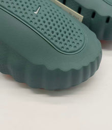 Nike Dark Green Slides with Orange Sole Details