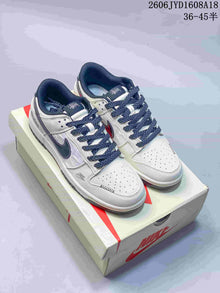 Nike SB Dunk Low White and Navy Sneakers