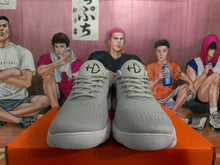 Nike Gray Low-Top Sneakers with Black Swoosh