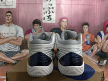 ASICS White and Blue Basketball Sneakers