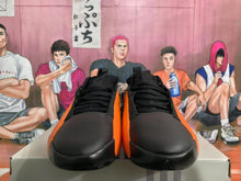 Black and Orange Sneakers