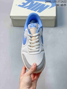 Jordan Air Jordan Skyline Low-Top Sneakers in White, Blue and Gray