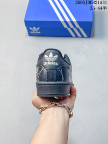 adidas Superstar Sneakers in Charcoal with Star Stitching