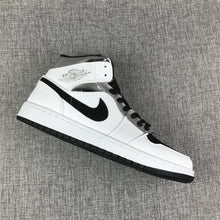 Jordan Air Jordan 1 Mid White Black Metallic Silver Sneakers