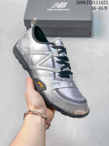 New Balance MT10OIY Silver Low-Top Sneakers