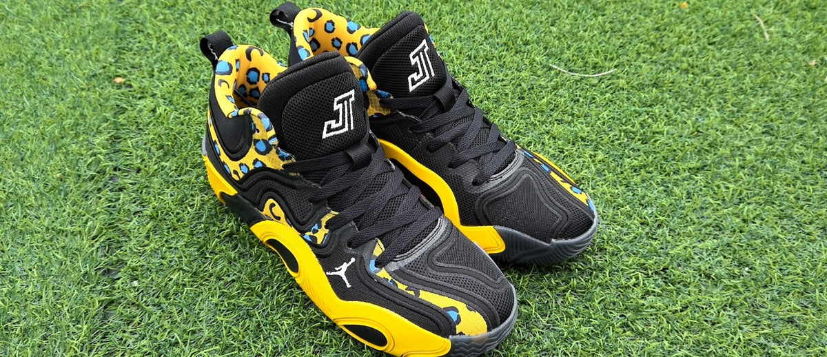 Jordan 680-7 Black and Yellow Leopard Print Sneakers