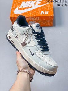 Nike Air Force 1 White Sneakers with Dark Swoosh Details