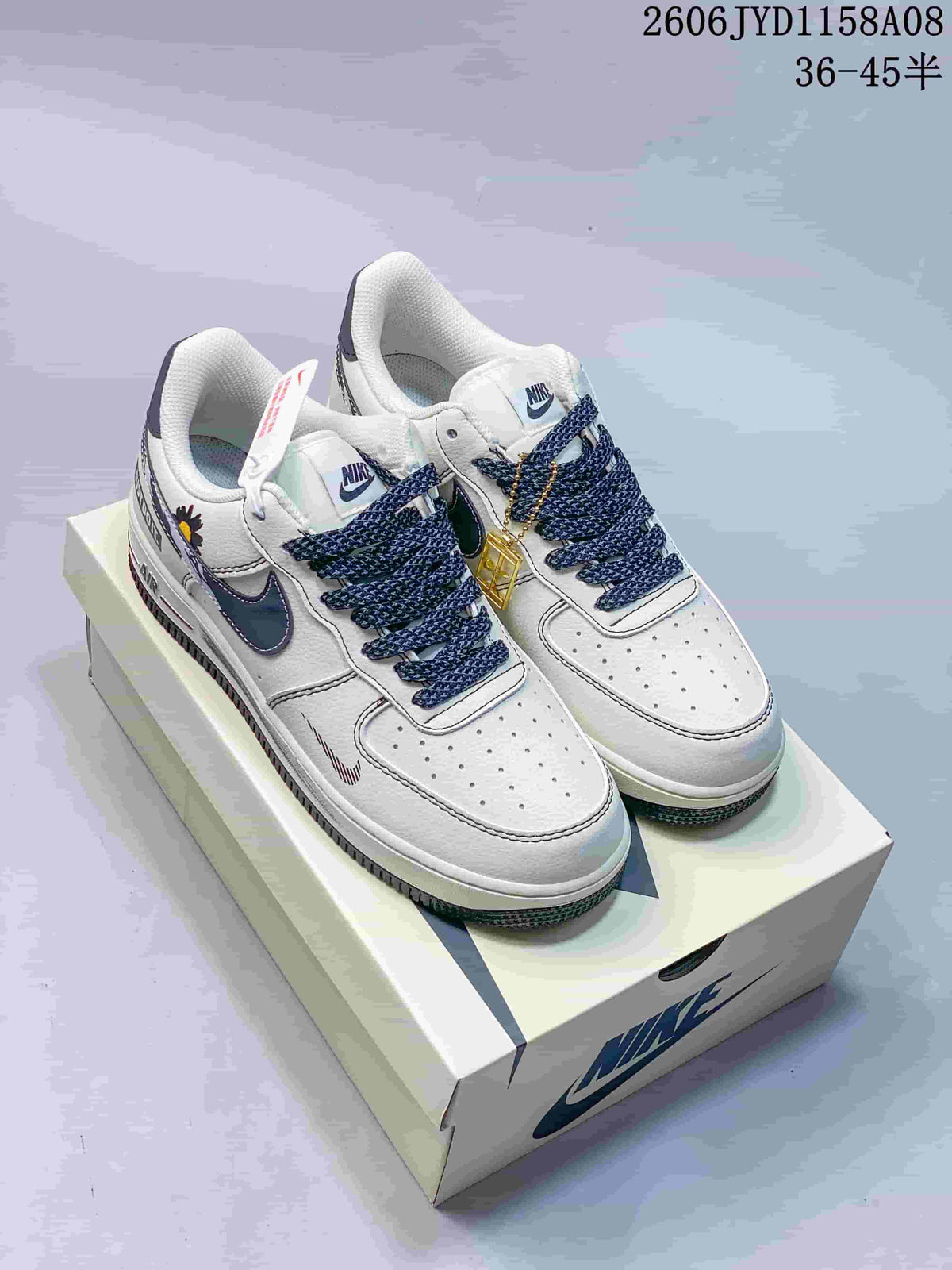 Nike Air Force 1 '07 Low Sneakers in White and Navy