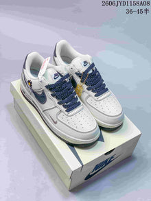 Nike Air Force 1 '07 Low Sneakers in White and Navy