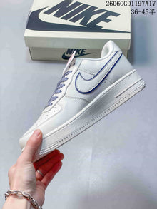 Nike Air Force 1 Low x Stüssy White and Navy Sneakers