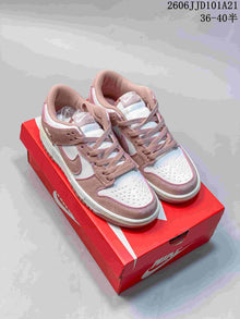 Nike Dunk Low SB Pink and White Low-Top Sneakers