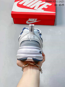 Nike Air Monarch IV White and Blue Low-Top Sneakers