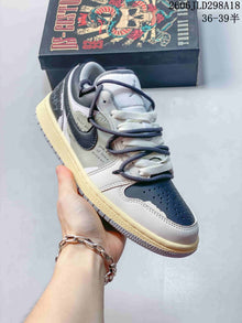 Jordan Air Jordan 1 Low Strap Sneakers in Gray and White