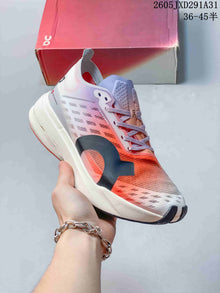 On Cloudboom Strike Running Shoes in Coral and Lilac