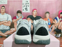 Gray and White Basketball Sneakers with Sculpted Details