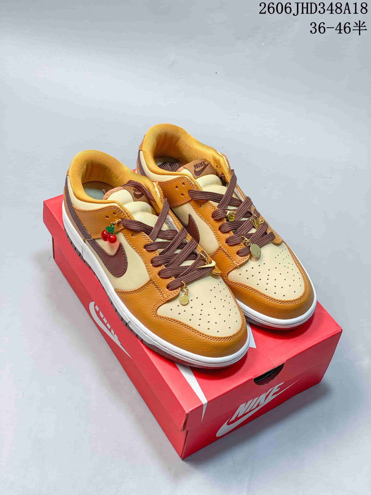 Nike SB Dunk Low Sneakers in Cream, Tan and Brown